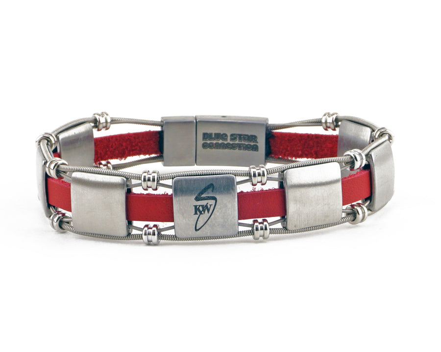 Take your merch to the next level with custom bracelets hand made from repurposed, used guitar strings by Retuned Jewelry in Colorado. Perfect for bands, musicians, music festivals, fundraisers and more! This bracelet was made for the Blue Star Connection fundraiser from Kenny Wayne Shepherd’s guitar strings.