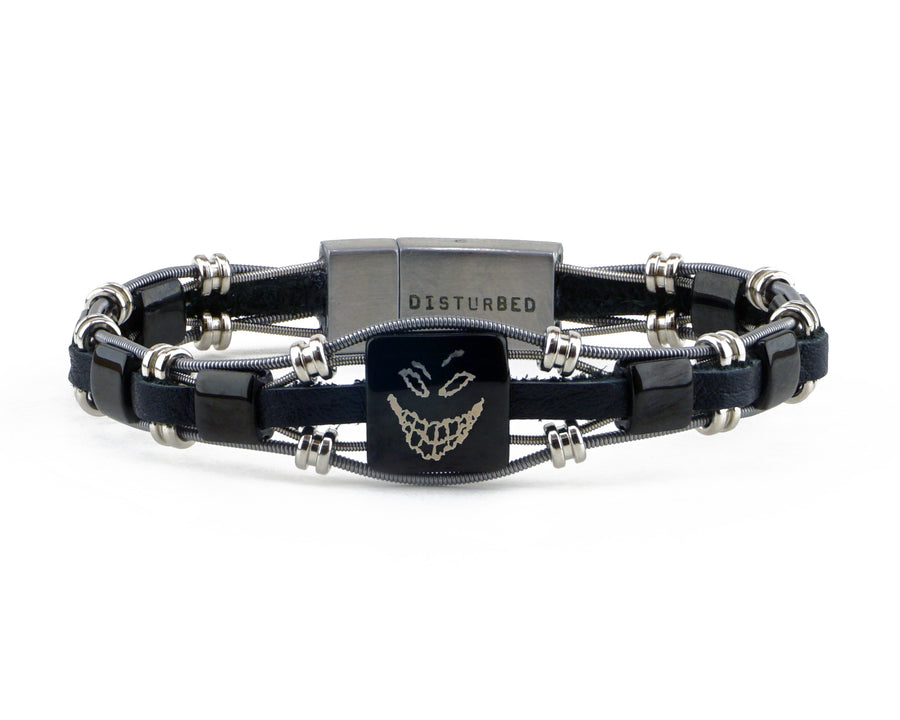 Take your merch to the next level with custom bracelets hand made from repurposed, used guitar strings by Retuned Jewelry in Colorado. Perfect for bands, musicians, music festivals, fundraisers and more! This sample bracelet was made for Disturbed.
