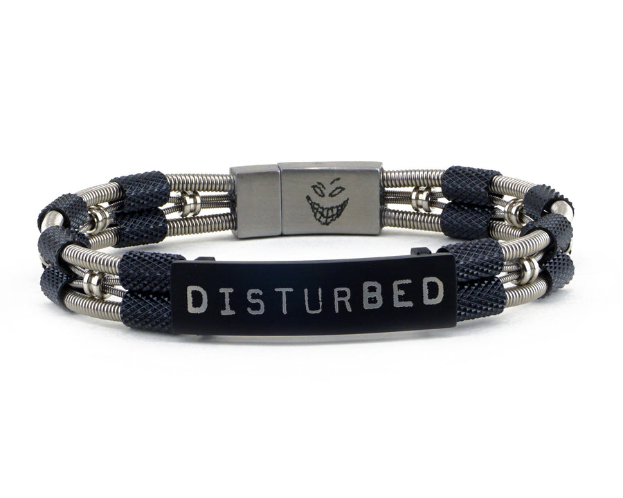 Take your merch to the next level with custom bracelets hand made from repurposed, used guitar strings by Retuned Jewelry in Colorado. Perfect for bands, musicians, music festivals, fundraisers and more! This sample bracelet was made for Disturbed.