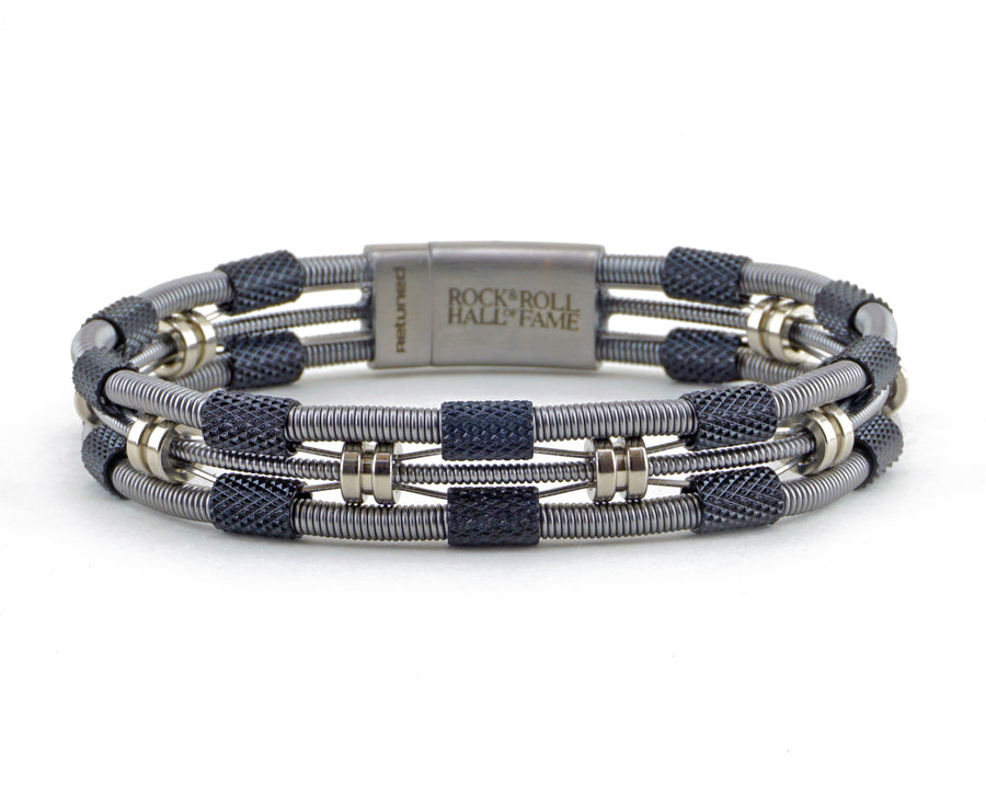 Take your merch to the next level with custom bracelets hand made from repurposed, used guitar strings by Retuned Jewelry in Colorado. Perfect for bands, musicians, music festivals, fundraisers and more! This sample was made for the Rock and Roll Hall of Fame.