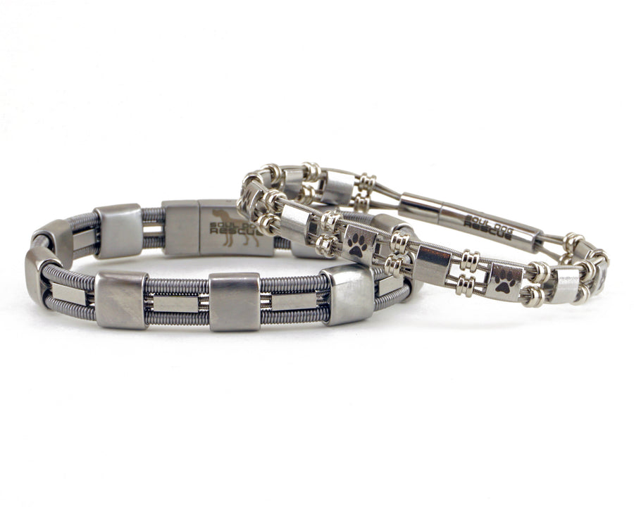 Take your merch to the next level with custom bracelets hand made from repurposed, used guitar strings by Retuned Jewelry in Colorado. Perfect for bands, musicians, music festivals, fundraisers and more! These bracelets were made for the Soul Dog Rescue fundraiser.